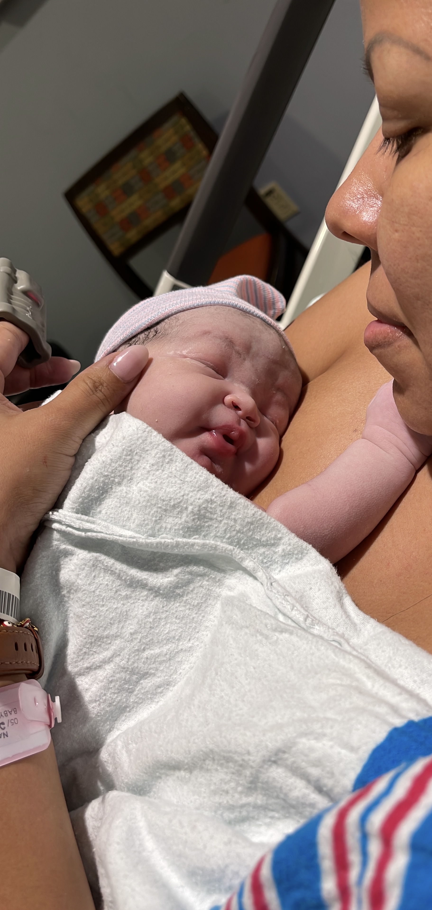 New mother holding her newborn baby